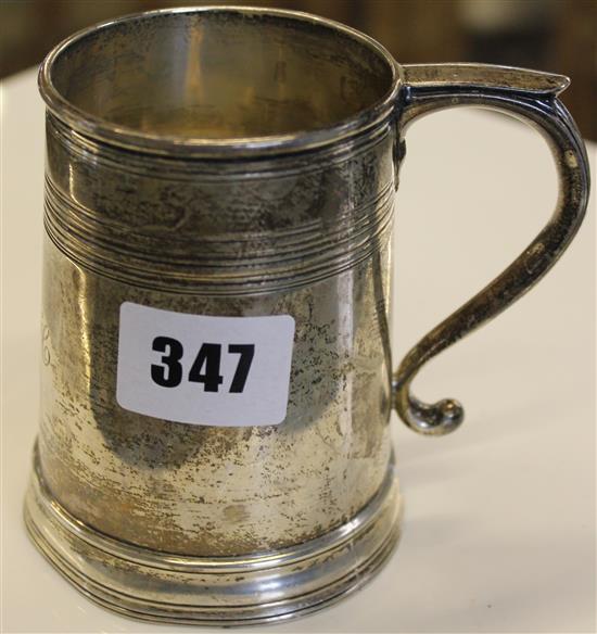 A ring turned silver mug